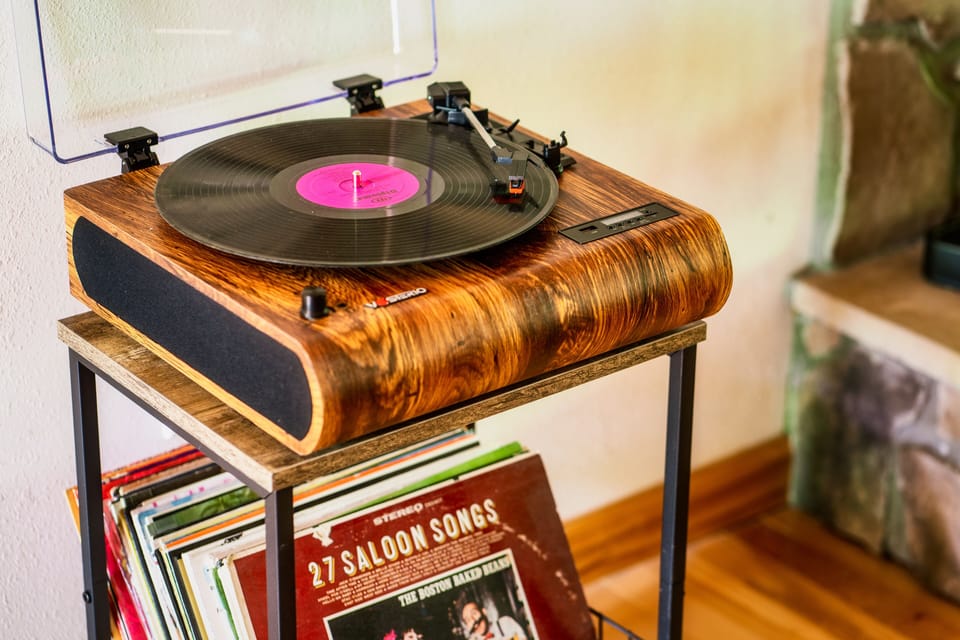 Record player to shake your tails or listen to old Saloon Songs!