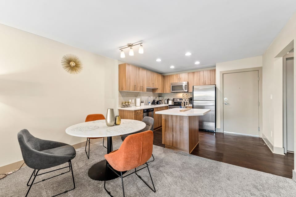 Open-concept design flows seamlessly, connecting cooking and relaxing.