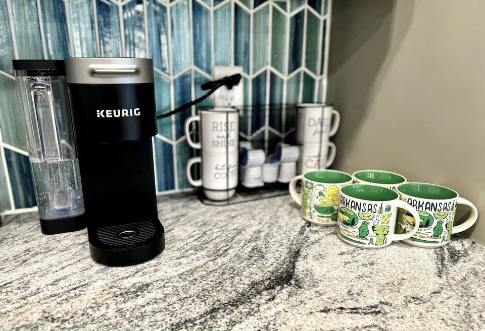 Coffee Nook: Sip your brew in style with charming mugs and a modern coffee maker!