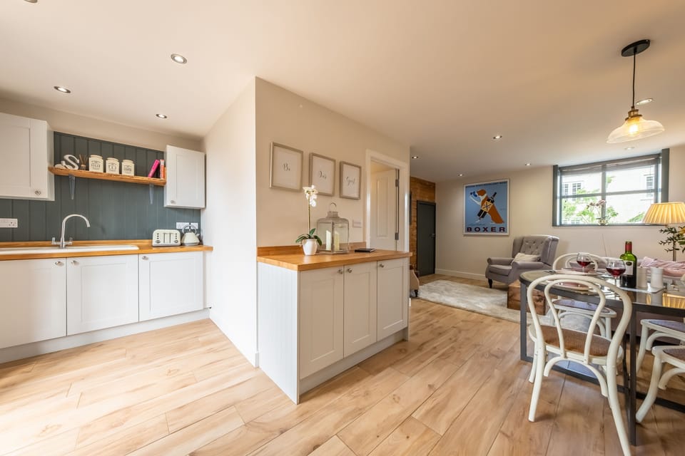 Ground floor: Dining area between the kitchen and seating area