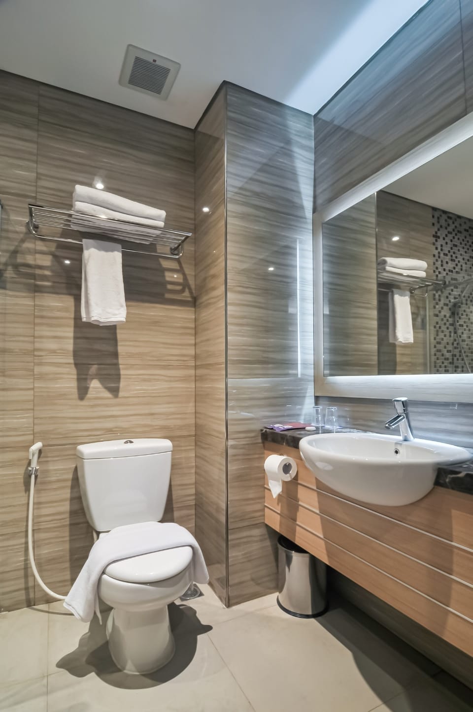 Shower, hair dryer, slippers, towels