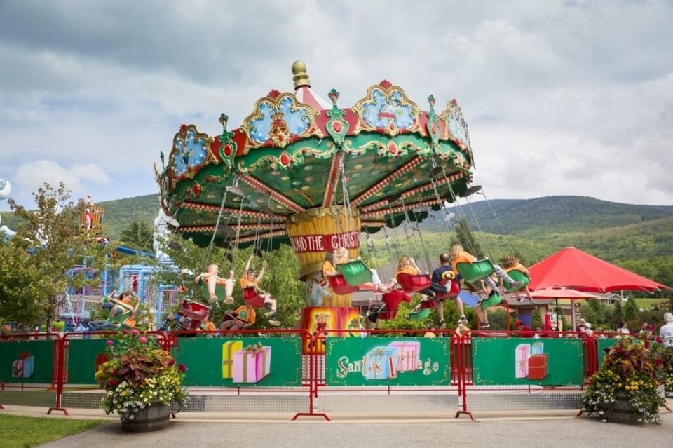 Family fun near Santa’s Village—colorful rides with mountain views