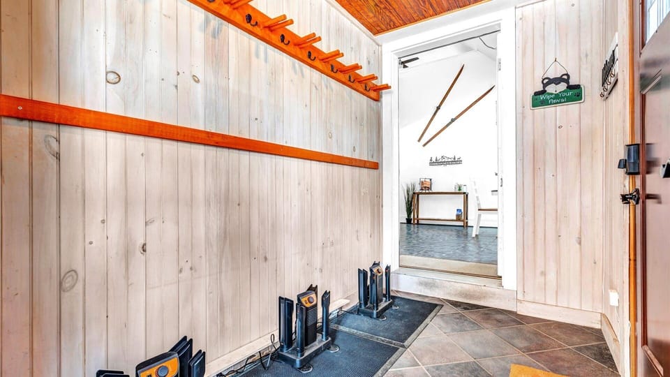 Once you enter, hang up your skis and dry your boots on the heaters