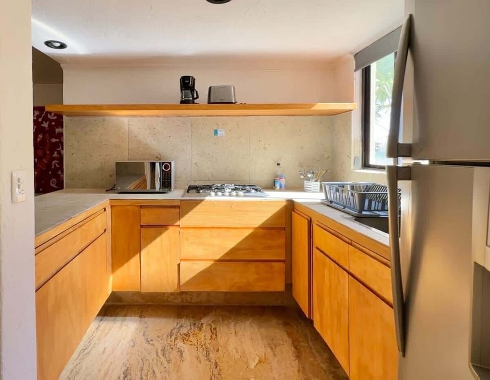 Kitchen with full appliances
