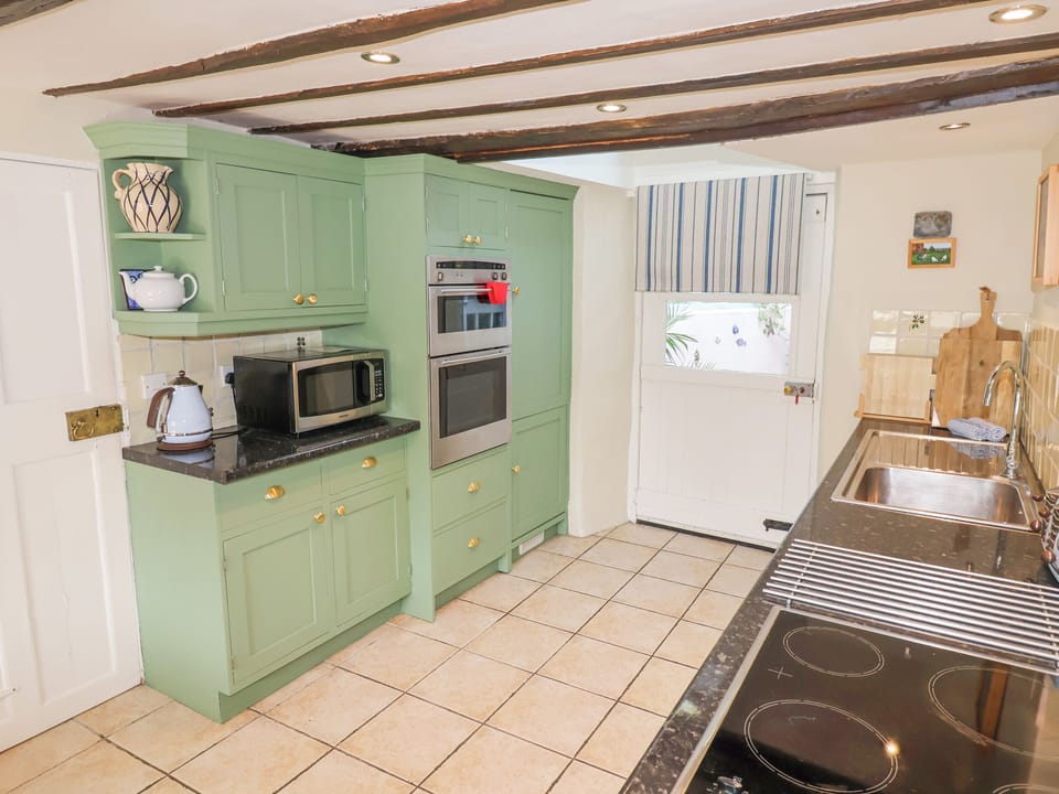 Fridge, microwave, dishwasher, cookware/dishes/utensils