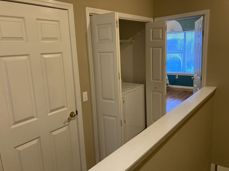 WASHER, DRYER, LOCATED IN UPSTAIRS HALLWAY 
TOWNHOUSE #27