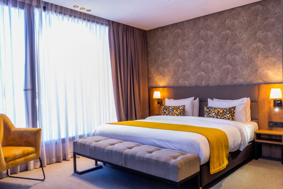 Executive Suite, 1 Bedroom, Garden View | Premium bedding, minibar, in-room safe, desk