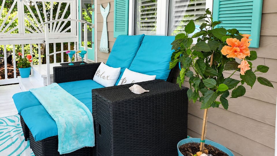 Your suite entrance and Private, tranquil patio with comfy loungers for morning coffee, evening wine
