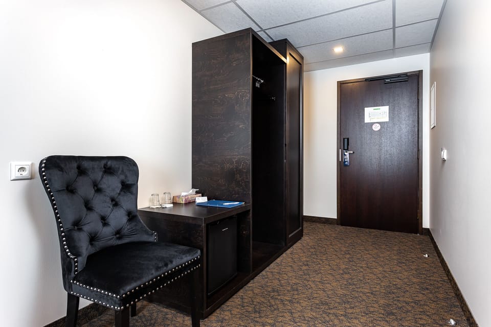 Double Room | Living area | 32-inch flat-screen TV with cable channels, TV, toys