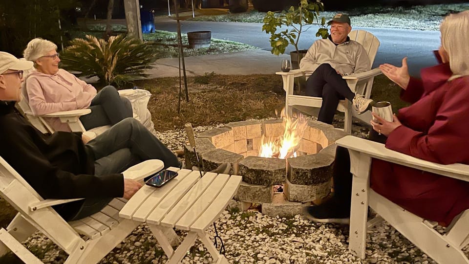 Guests hanging together around the cozy fire-pit. Fantastic way to end the day!