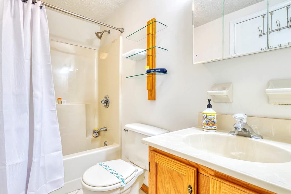 Second Bathroom | Full bathroom located on second floor. Bathroom has two doors, one connects to bedroom and other is a hallway entrance