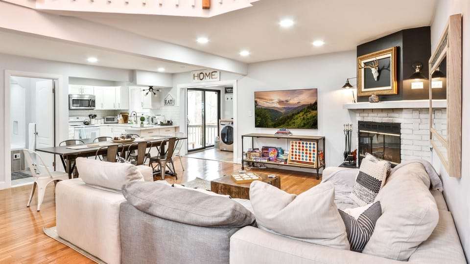 Enjoy bright, airy spaces with modern decor and a fireplace for relaxed evenings!