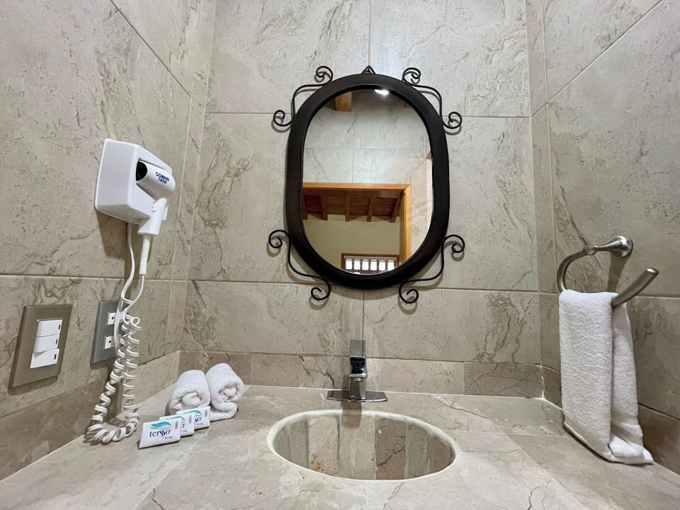 Family Cabin | Bathroom | Shower, rainfall showerhead, hair dryer, towels