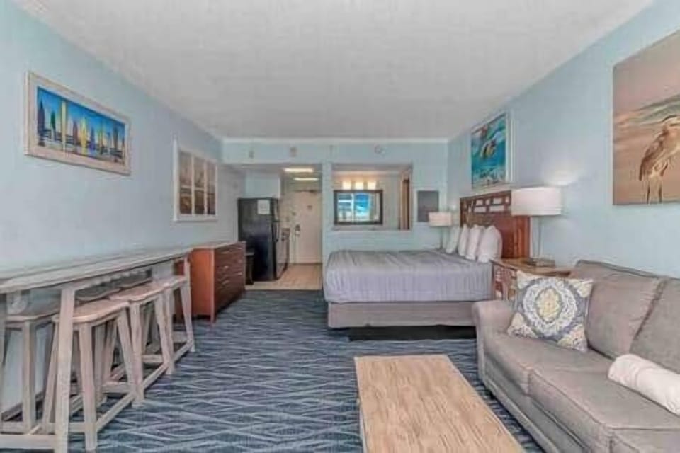 Large Open Layout with Dining Space & Comfortable Seating  Spacious layout includes dining table, so