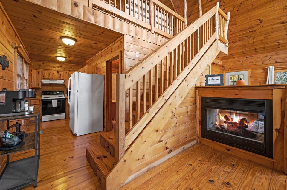 Inviting stairs lead you up to a loft retreat where you can relax and recharge.