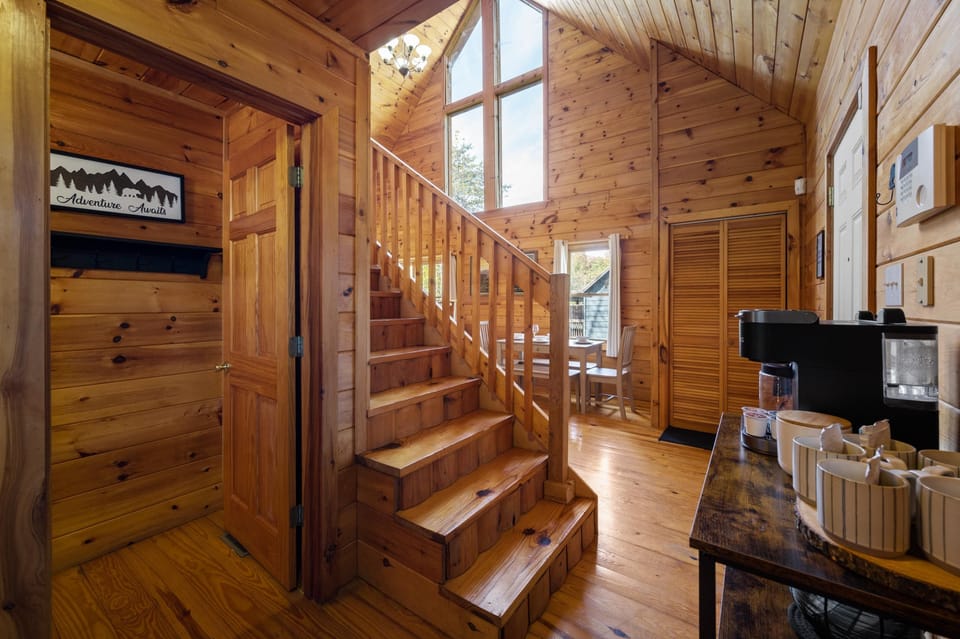 Bathroom entrance by the stairs. Accessible from the master bedroom and kitchen.