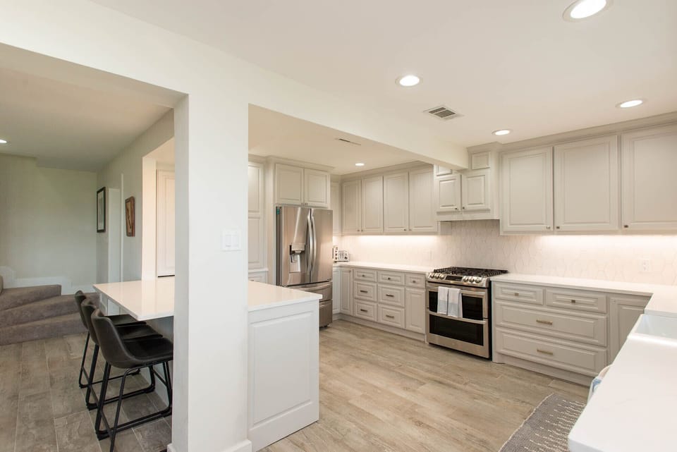 The large and spacious kitchen offers all the amenities of home.