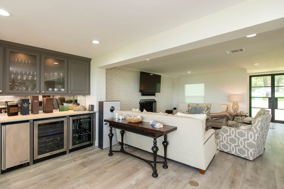 The bar right off the living area is ideal for entertaining.