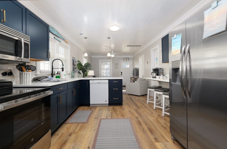Modern and Open kitchen with countertop seating. Newly Remodeled!