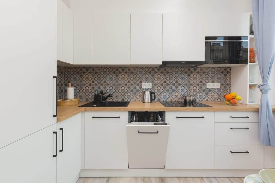  The kitchen's bright space is perfect for preparing meals. 