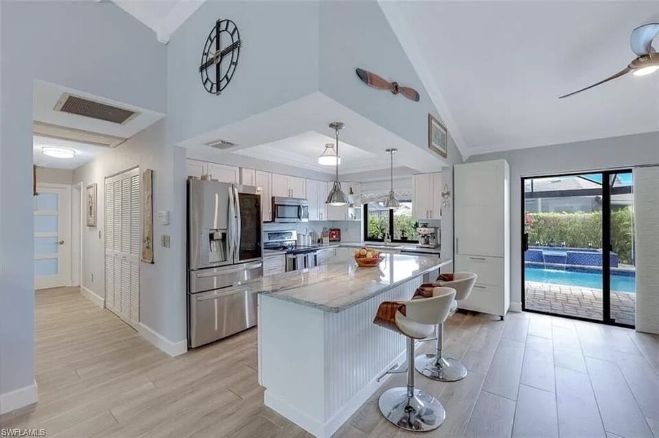 Big open kitchen and family room opens out onto the pool and spa.