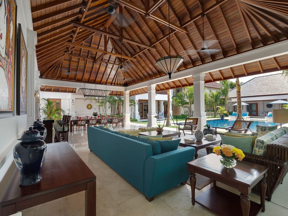 Villa | Living area | 60-inch TV with satellite channels