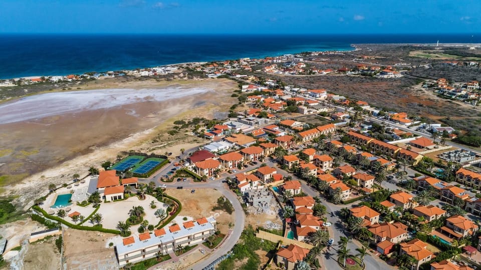 Gold Coast is located in prestigious Malmok, just blocks away from the scenic northwest coastline which boasts some of the Island's most beautiful white-sand beaches surrounded by crystal aqua-marine waters.