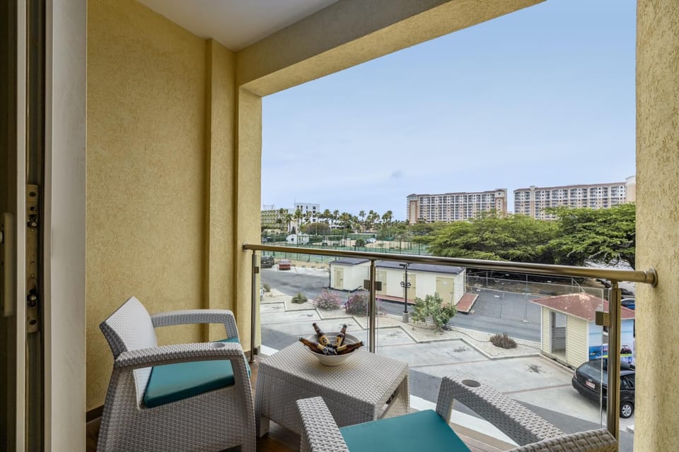 Spend time reading your books or just drinking your cold beer on this private balcony.