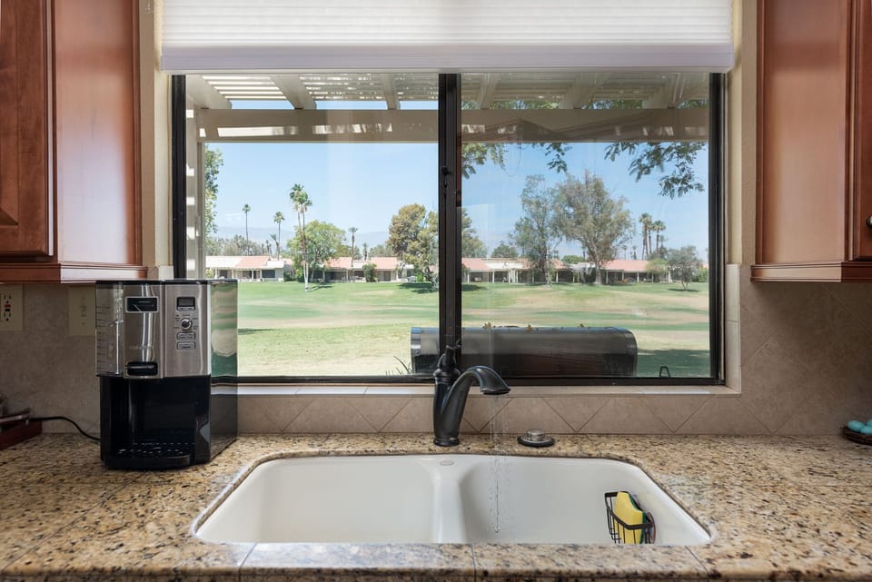 Dread doing the dishes? So much better with this view of the golf course!
