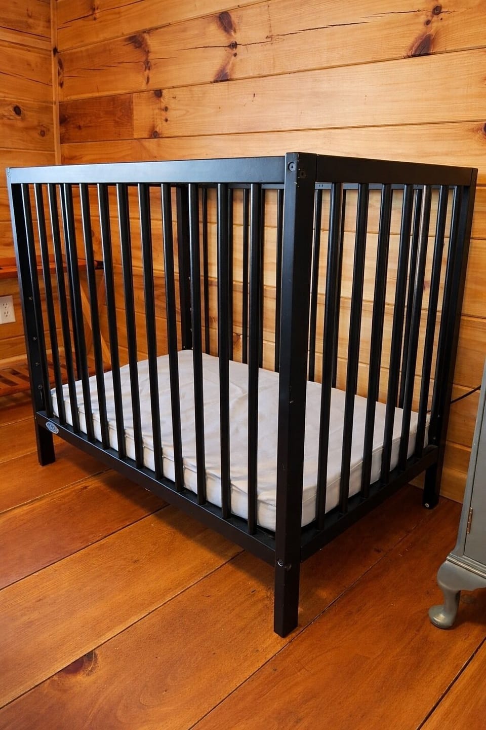Mini crib 
Dimensions 26.18"L x 40.08"W