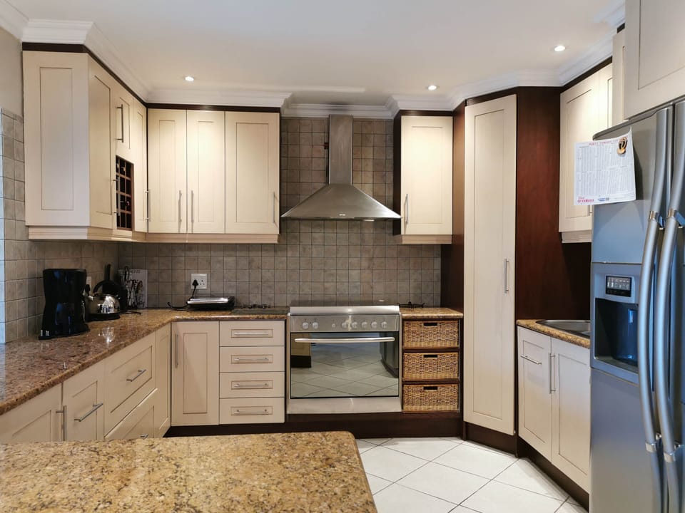 Family House | Private kitchen | Fridge, electric kettle, dining tables