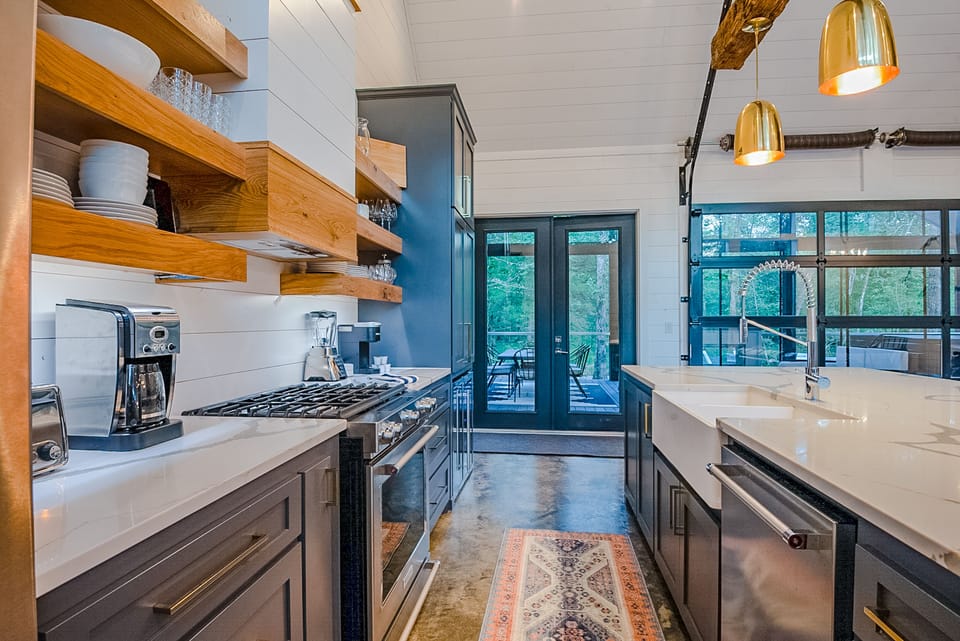 The modern kitchen has full size refrigerator/freezer, gas stove, oven, dishwasher, and microwave. The Keurig coffee maker K-cups and drip coffee.