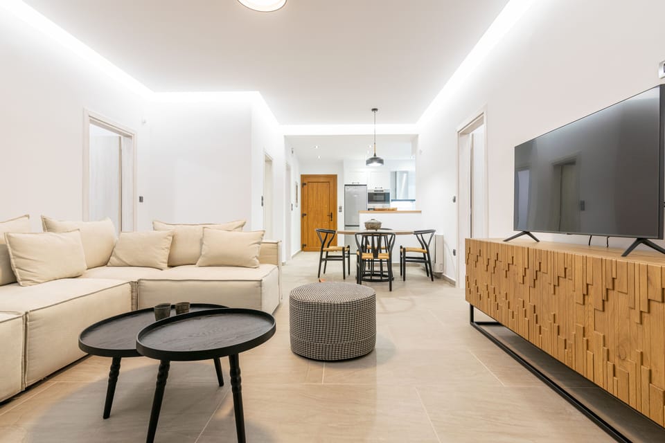 Deluxe Villa, 3 Bedrooms, Pool View | Living area | TV