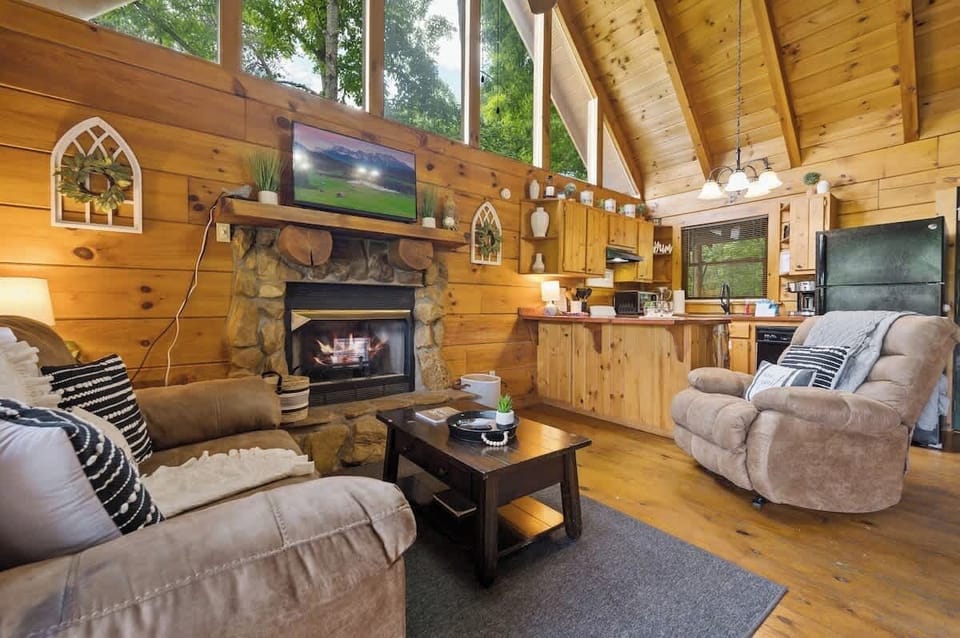 Step into pure comfort and relaxation at our charming cabin!  With a cozy living room, a toasty propane fireplace, and a flat screen TV.