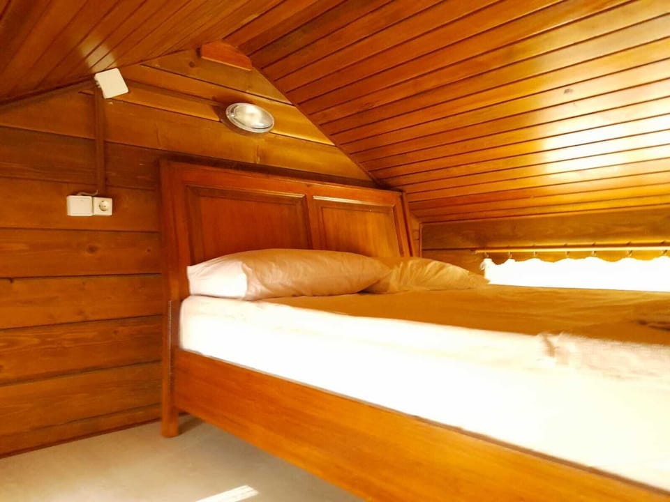 Family Tree House, 1 Bedroom, Patio, Garden Area | 1 bedroom, premium bedding, blackout drapes, rollaway beds