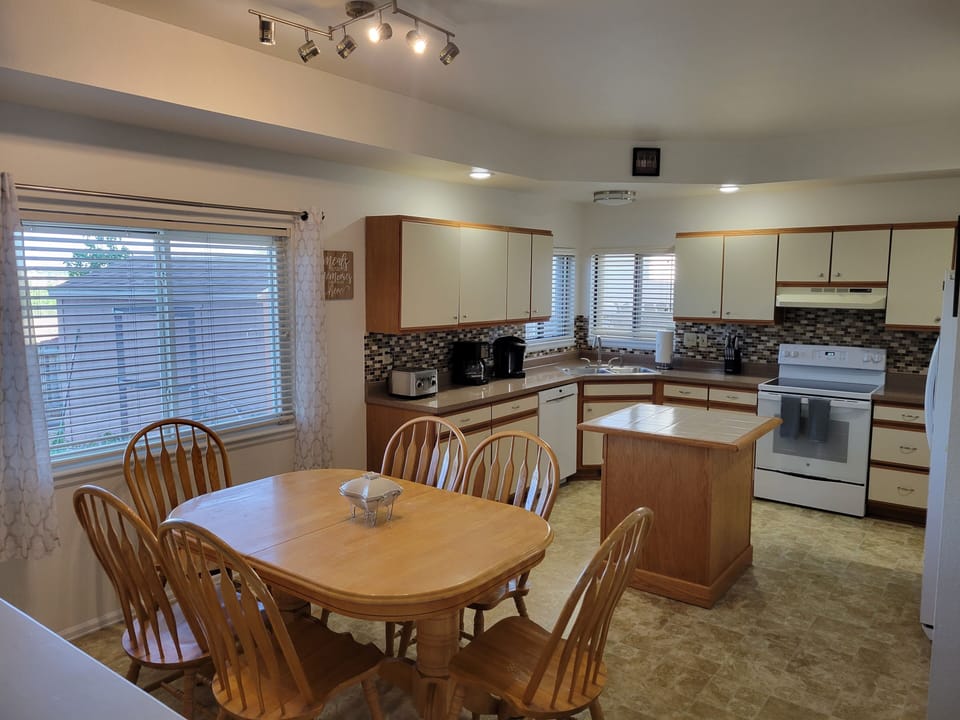 Open kitchen with dining area 