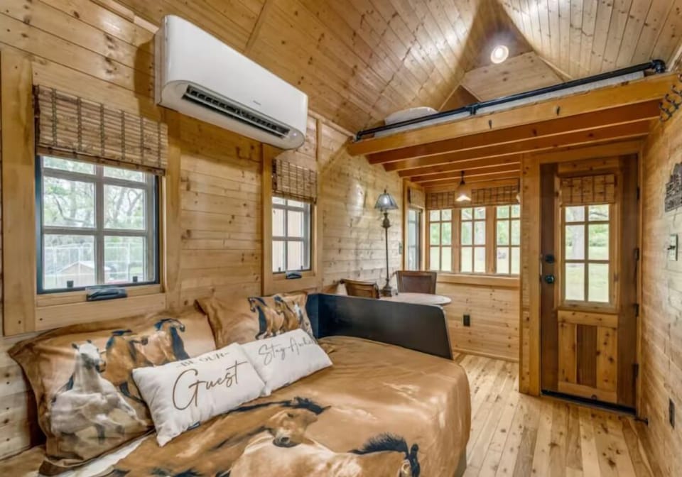 Pull out King Bed and Loft with a twin bed.