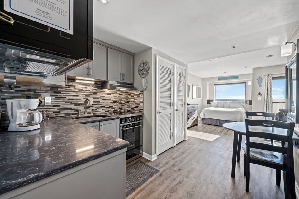 Deluxe Studio Suite, Balcony, Oceanfront (Renaissance Tower 1203) | Private kitchen | Full-size fridge, oven, stovetop, dishwasher