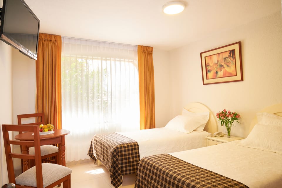 Twin Room | Individually furnished, desk, free WiFi, bed sheets