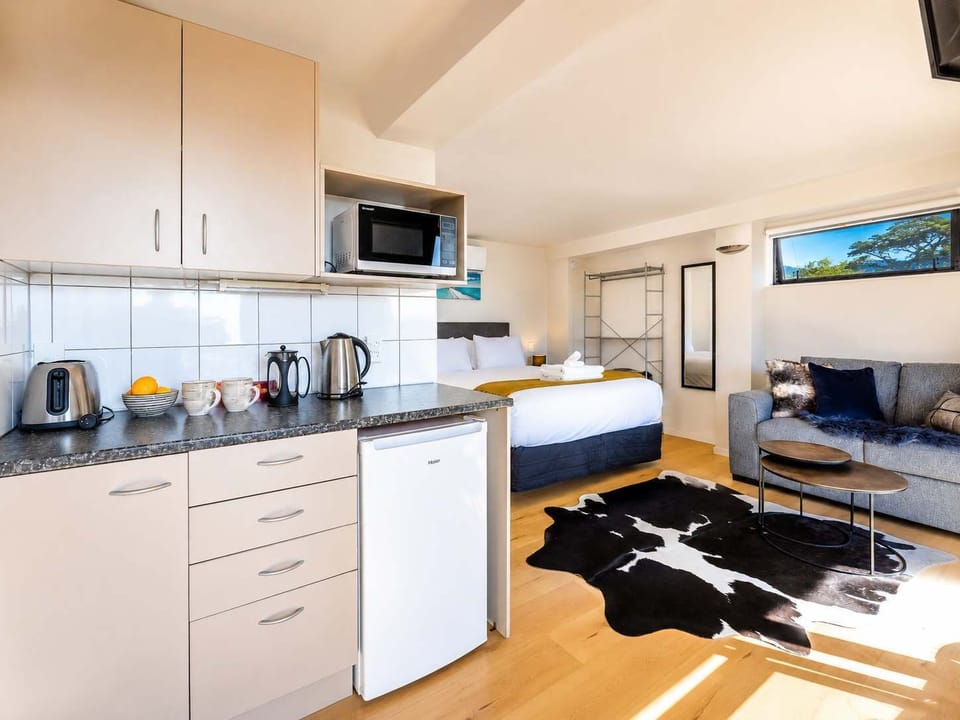 Kitchenette with bar fridge, kettle, microwave. Plunger coffee and tea provided