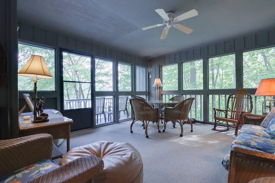 Enclosed porch with lots of seating