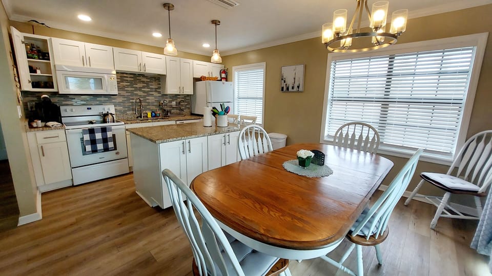 Fully stocked kitchen, 4 burner stove + oven, 2 coffee makers, toaster, microwave, pots/pans