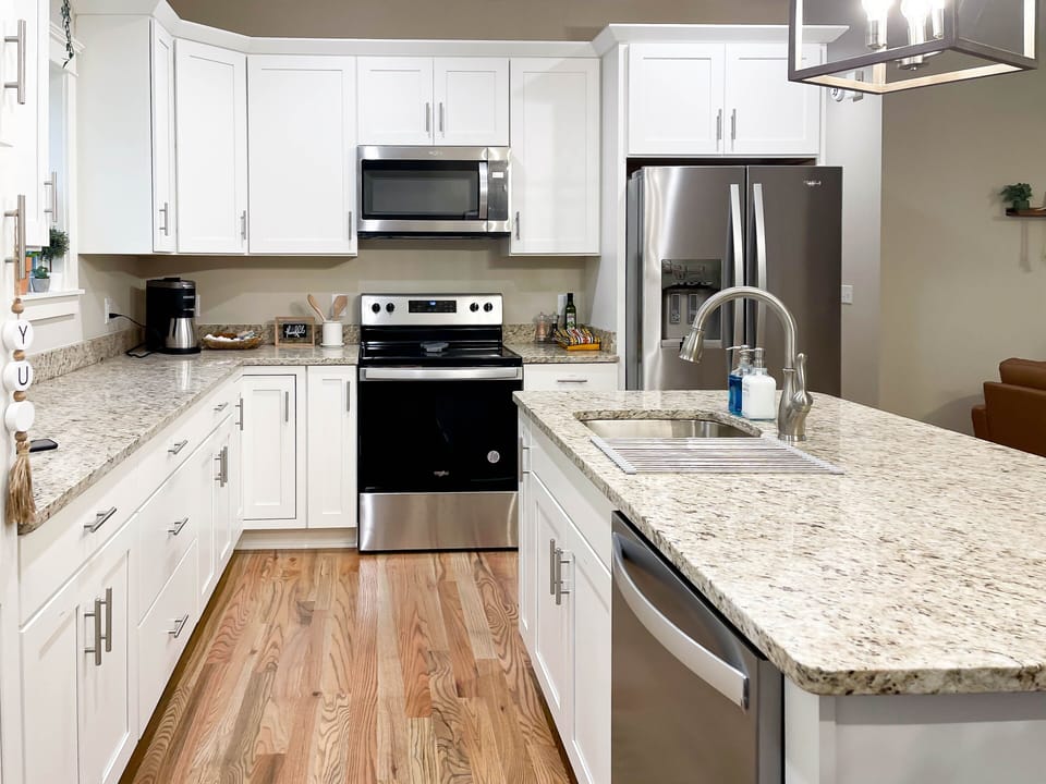 Brand new appliances + full kitchen with all cooking pots/pans and utensils