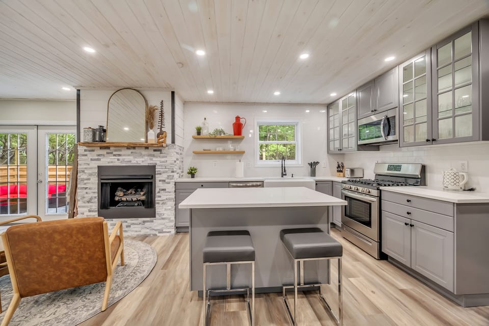The luxury kitchen with center island is equipped with all your essentials