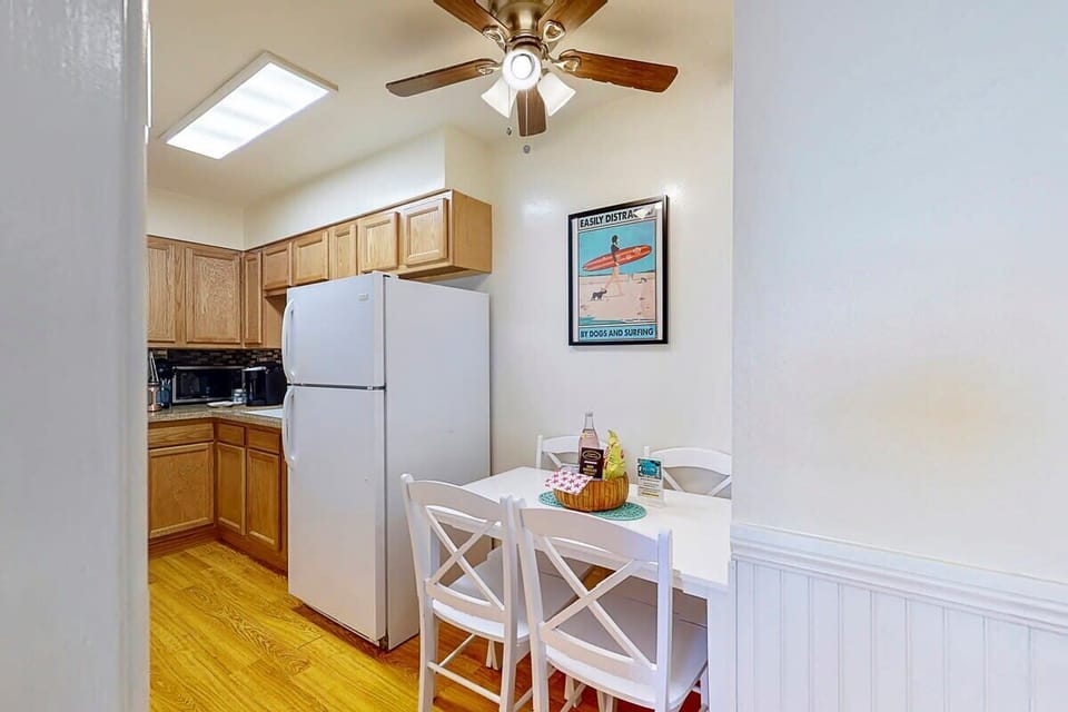 Fully stocked kitchen with a full refrigerator, electric stove and all appliances, dishware, baking items, silverware, etc.