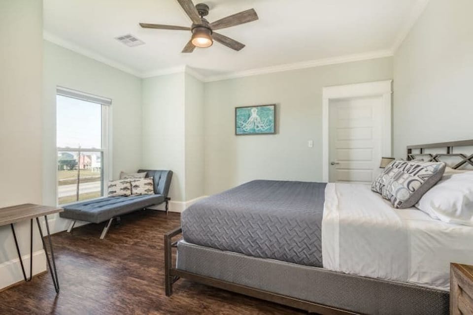 Third bedroom upstairs with king size bed