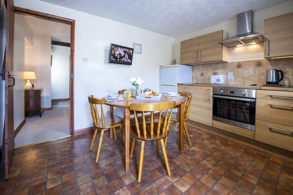 Ground floor: Kitchen with seating for four guests