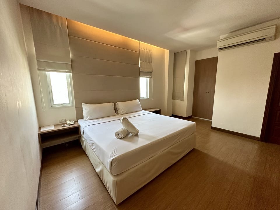 Deluxe Double Room | Minibar, desk, blackout drapes, free WiFi