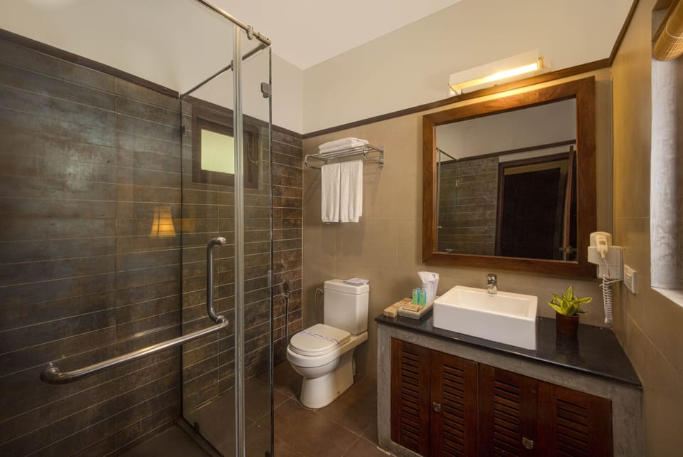 Deluxe Room | 1 bedroom, minibar, in-room safe, desk