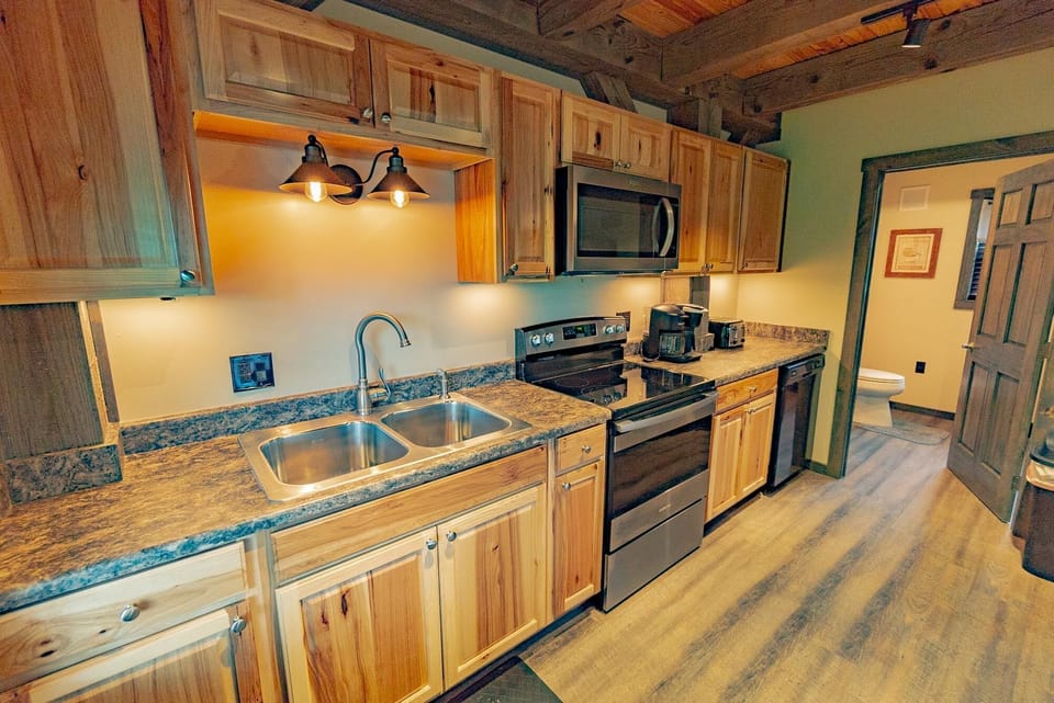 Kitchen - Main Level. Modern and elegant stocked kitchen.